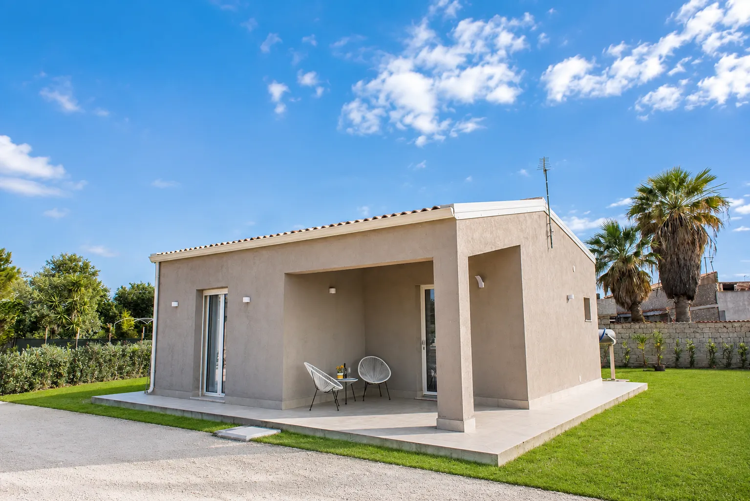 Veranda esterna di una casa vacanza de L’Oasi di Samuel